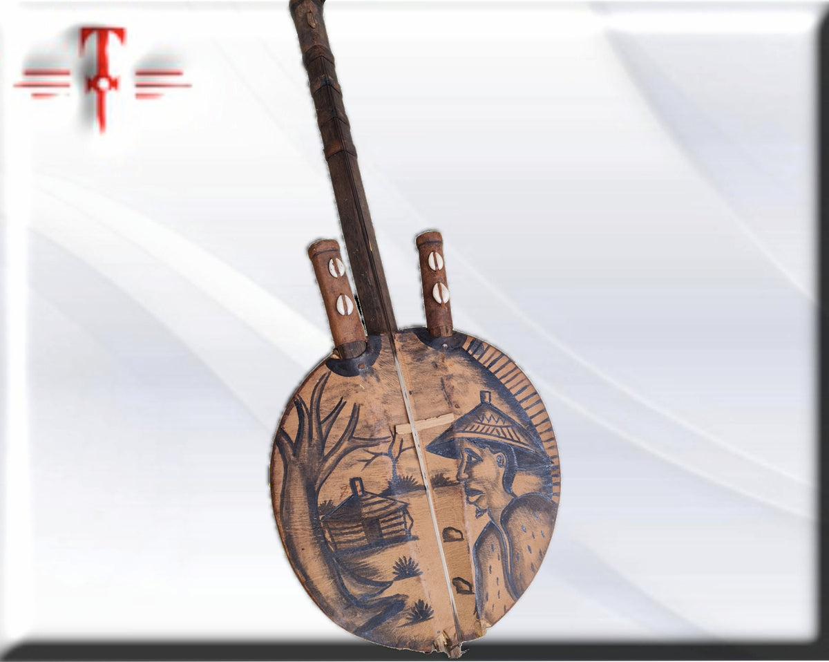 Afrikanische handgefertigte Gitarre – Kora. Afrikanische Musikinstrumente aus Holz: Trommeln, Maracas oder Kashakas und Gonkoque