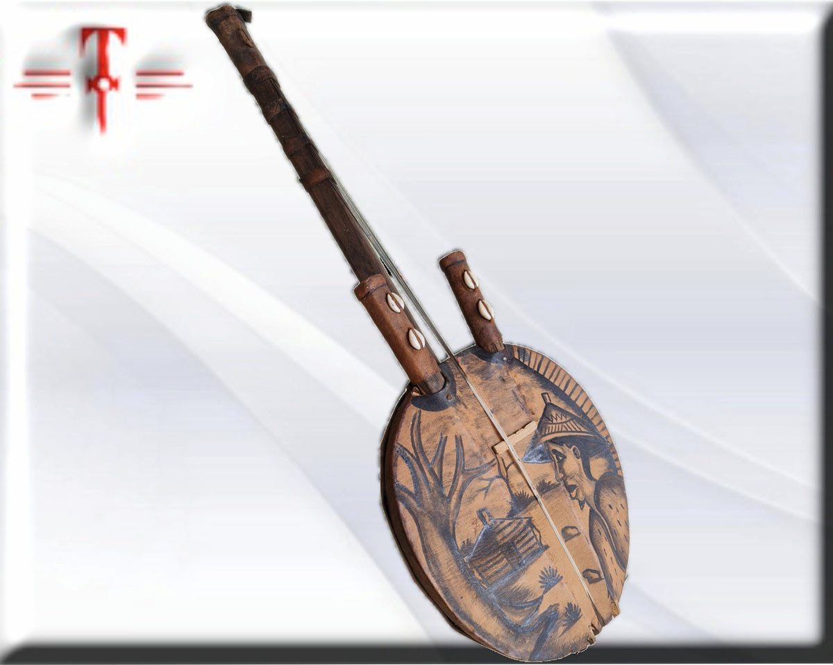 Afrikanische handgefertigte Gitarre – Kora. Afrikanische Musikinstrumente aus Holz: Trommeln, Maracas oder Kashakas und Gonkoque