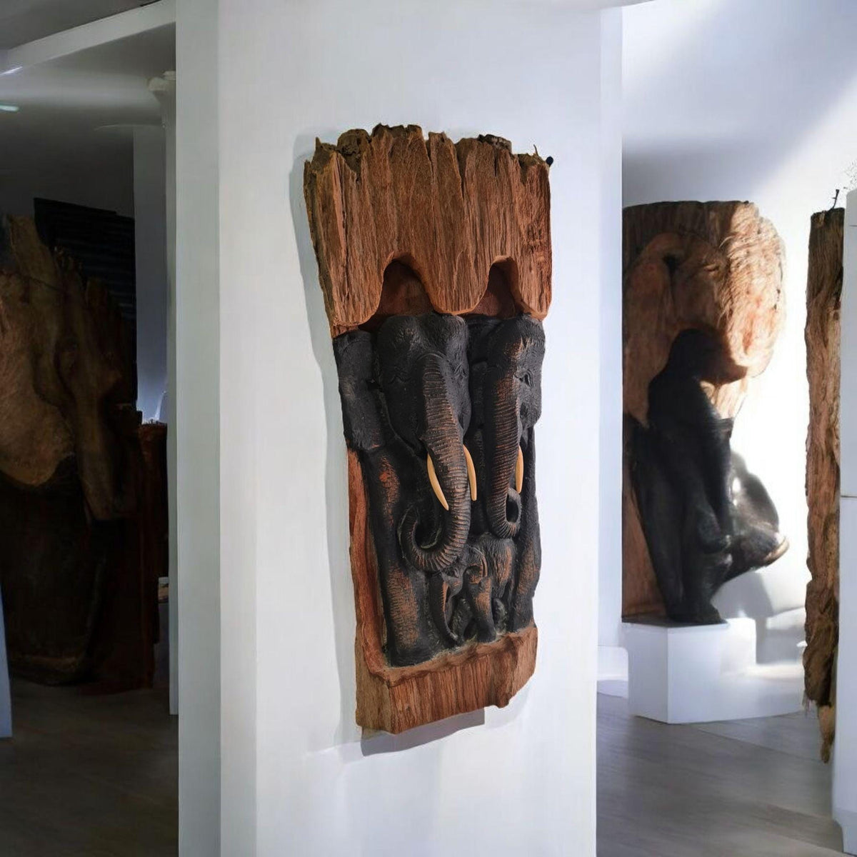 Antigua Talla de madera con Familia de elefantes